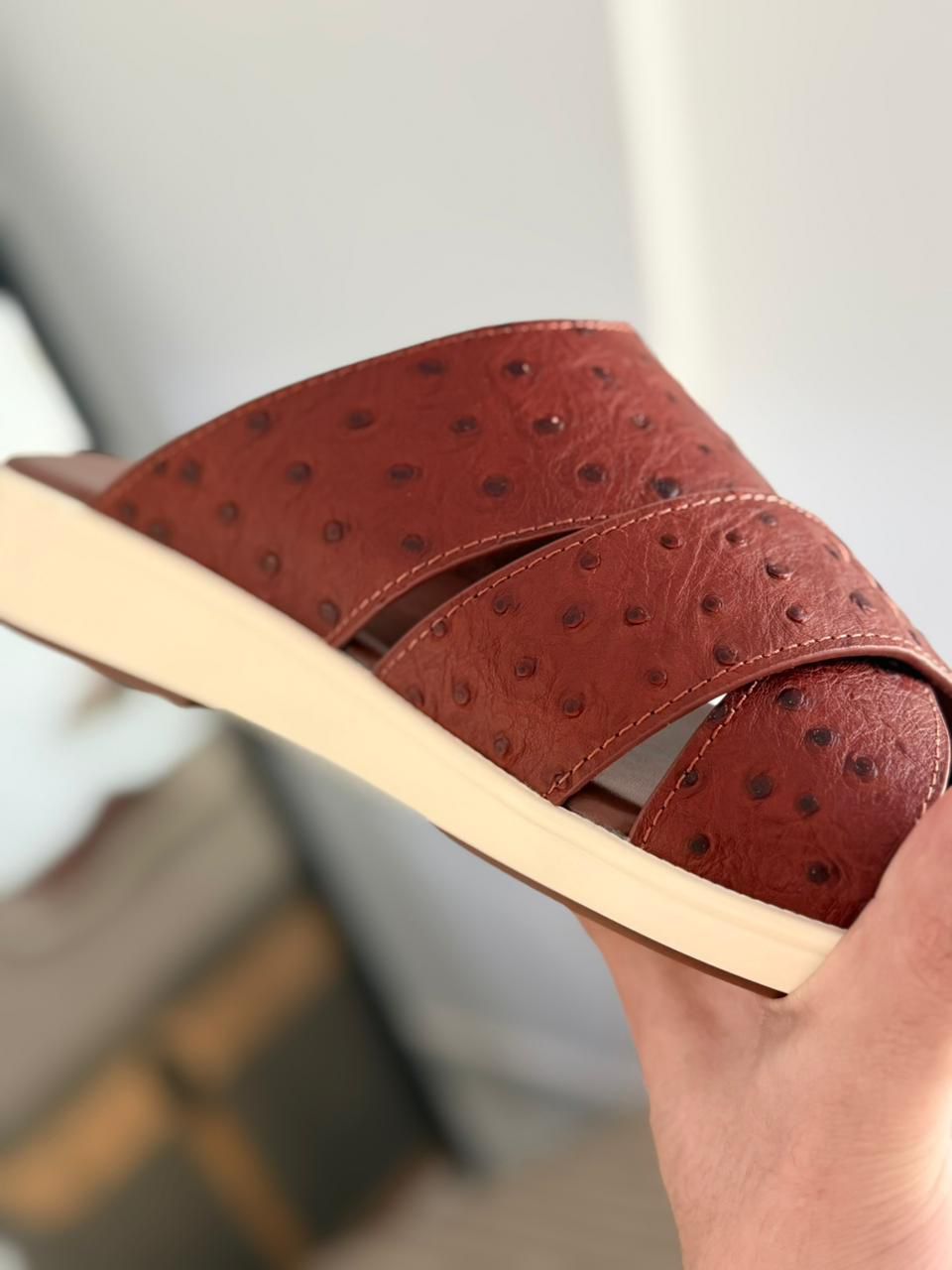 Loro Piana Palm Walk Sandals crafted from ostrich leather.