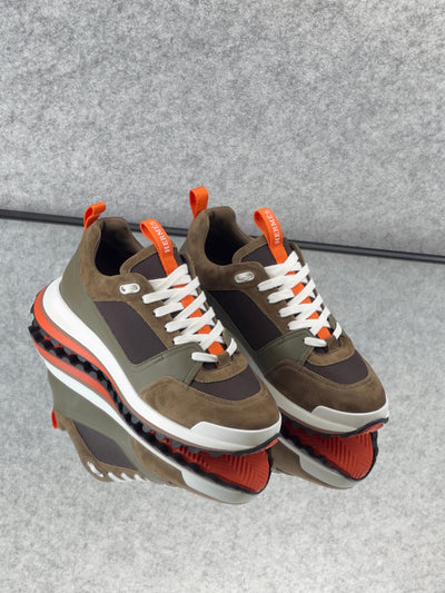 Hermès Leader Sneakers are crafted from a combination of technical twill, calfskin, and suede goatskin.