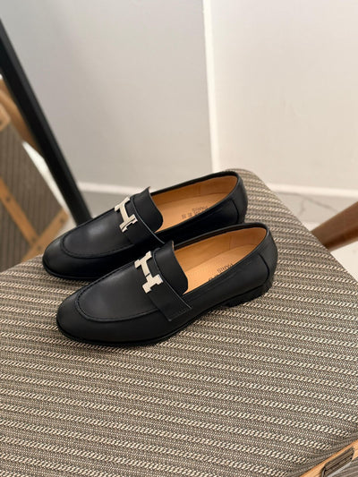 Hermès Paris Loafer, featuring a signature "H" buckle and goatskin leather construction.