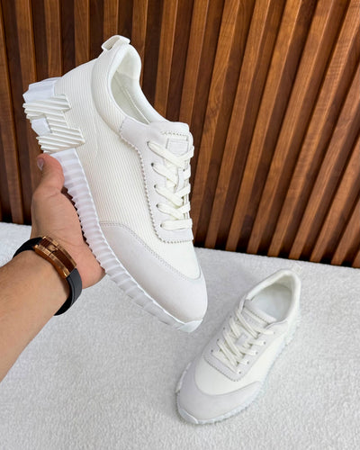 Hermès Paris Bouncing Sneaker in Triple White – All-White Calfskin & Mesh Urban Sneaker.