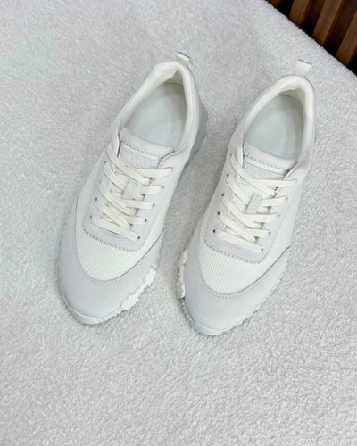 Hermès Paris Bouncing Sneaker in Triple White – All-White Calfskin & Mesh Urban Sneaker.