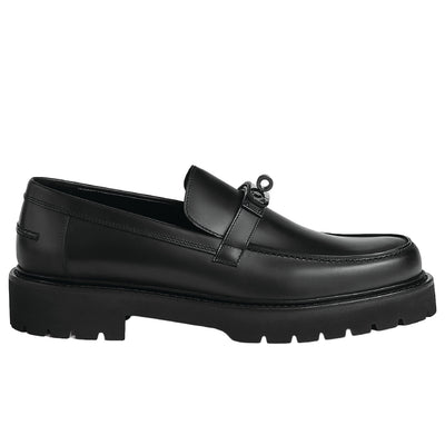 Hermès Icone loafer in black calfskin leather featuring a Kelly buckle and a light notched sole.